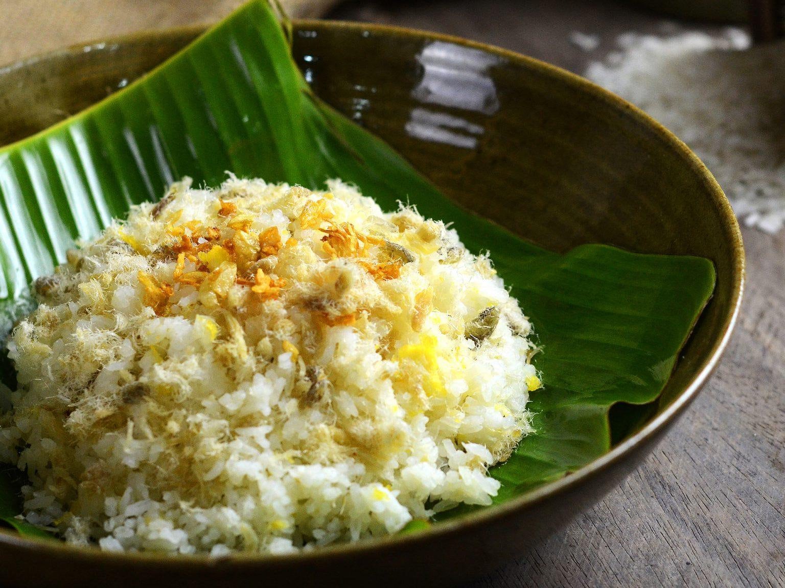 Sticky rice is frequently wrapped in banana or dong leaves before steaming, enhancing both flavor and cultural authenticity